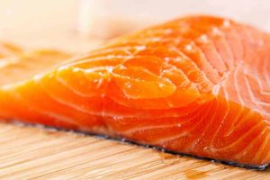 Vælg opdrættet laks og ørred, hvis du vil spise fisk med lavt dioxin-indhold